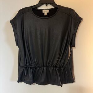 Faux leather top with topstitching detail